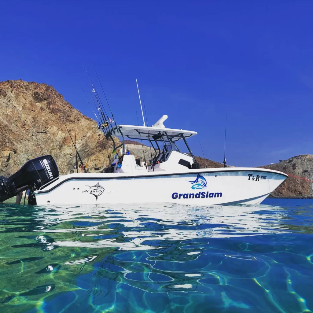 Grandslam fishing charter boat cruising on the ocean in Fujairah UAE