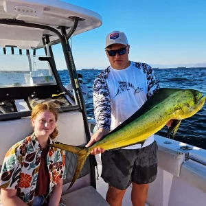 Father and daughter showing off their catch on fishing charter in Fujairah UAE